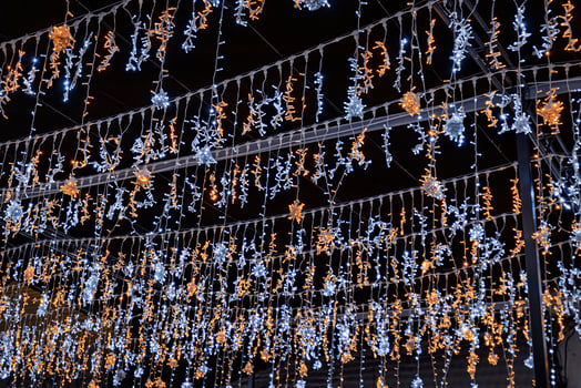 Christmas garlands with LED lamps against the black night sky. photo