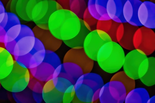 Christmas lights blured background. Light bokeh from Xmas decoration. photo