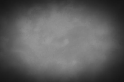 Blured gray decorative plaster or concrete background with vignette. photo