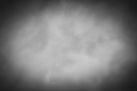 Blured gray decorative plaster or concrete background with vignette. photo