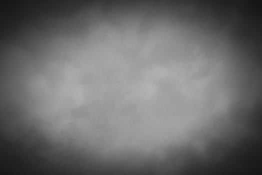 Blured gray decorative plaster or concrete background with vignette. photo