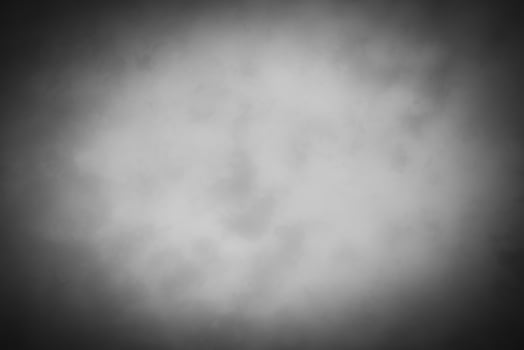 Blured gray decorative plaster or concrete background with vignette. photo