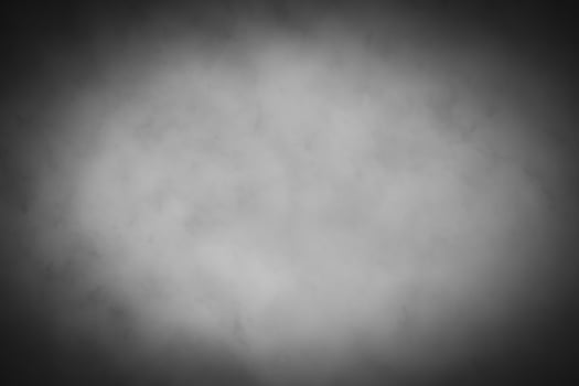 Blured gray decorative plaster or concrete background with vignette. photo