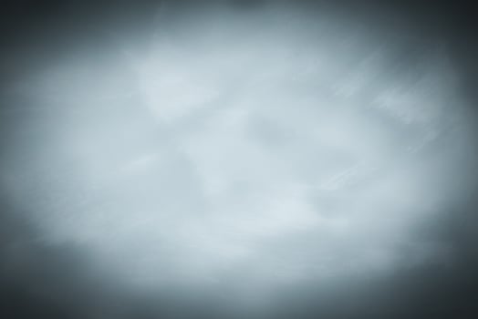 Blured pastel color decorative plaster or concrete background with vignette. photo
