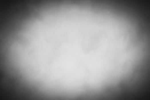 Blured gray decorative plaster or concrete background with vignette. photo