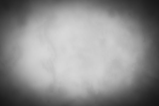 Blured gray decorative plaster or concrete background with vignette. photo