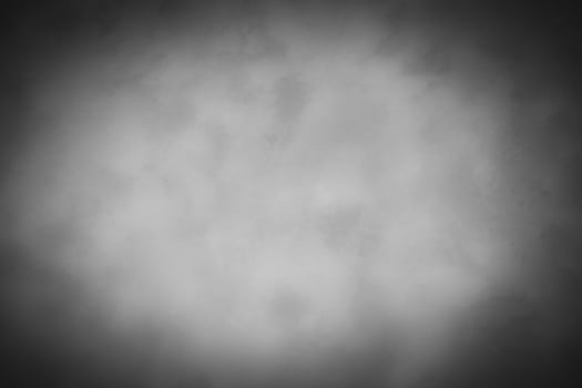 Blured gray decorative plaster or concrete background with vignette. photo