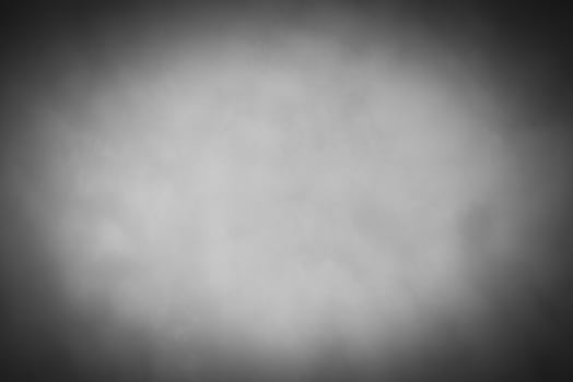 Blured gray decorative plaster or concrete background with vignette. photo