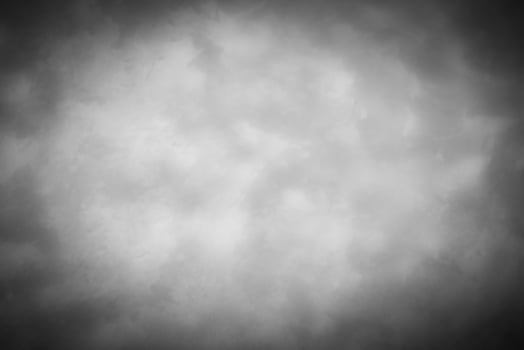 Gray decorative plaster or concrete background with vignette. photo