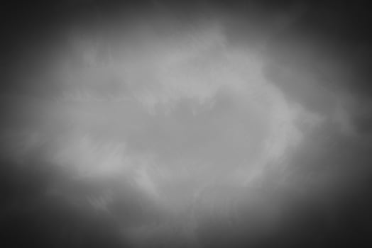Blured gray decorative plaster or concrete background with vignette. photo