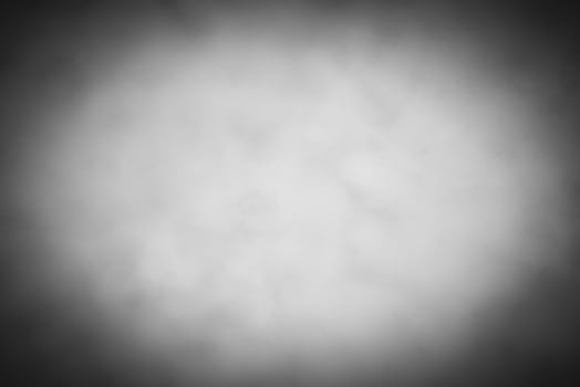 Blured gray decorative plaster or concrete background with vignette. photo