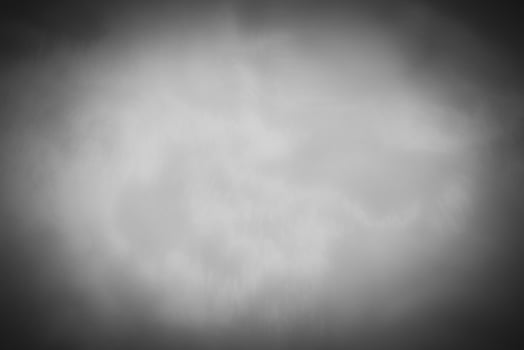 Blured gray decorative plaster or concrete background with vignette. photo