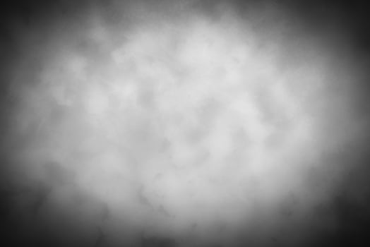 Gray decorative plaster or concrete background with vignette. photo
