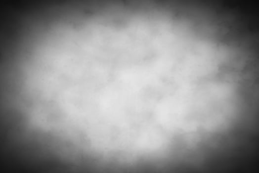 Gray decorative plaster or concrete background with vignette. photo