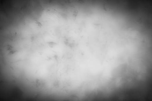 Gray decorative plaster or concrete background with vignette. photo