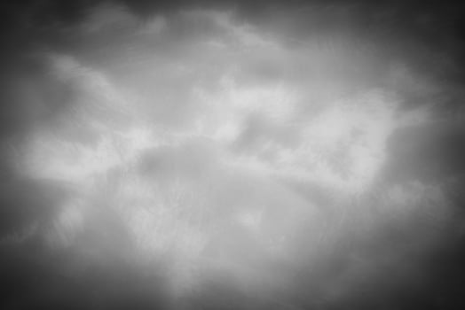Gray decorative plaster or concrete background with vignette. photo