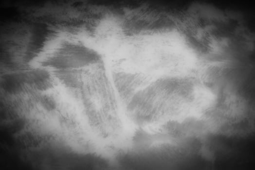 Gray decorative plaster or concrete background with vignette. photo
