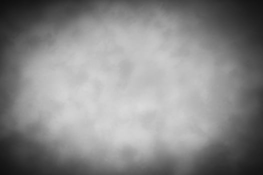 Gray decorative plaster or concrete background with vignette. photo