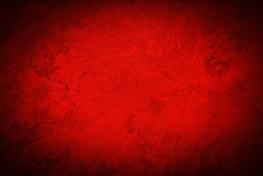 Texture of red decorative plaster or concrete with vignette. photo