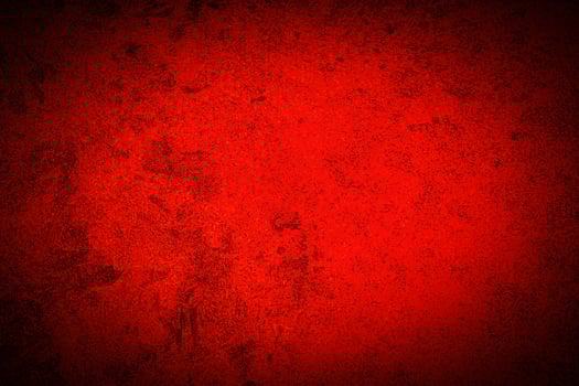 Texture of red decorative plaster or concrete with vignette. photo