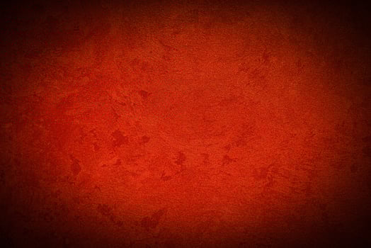 Texture of red decorative plaster or concrete with vignette. photo