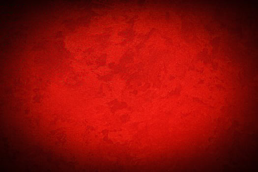 Texture of red decorative plaster or concrete with vignette. photo