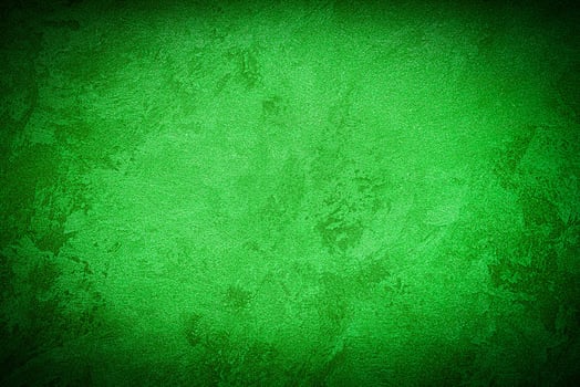 Texture of green decorative plaster or concrete with vignette. photo