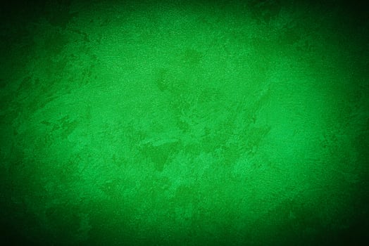 Texture of green decorative plaster or concrete with vignette. photo