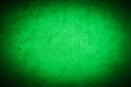 Texture of green decorative plaster or concrete with vignette. photo