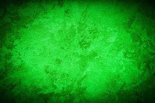 Texture of green decorative plaster or concrete with vignette. photo