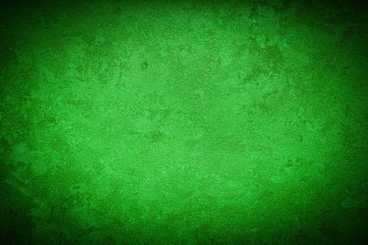 Texture of green decorative plaster or concrete with vignette. photo