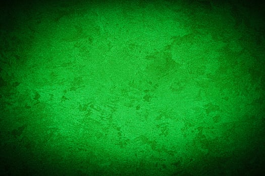 Texture of green decorative plaster or concrete with vignette. photo