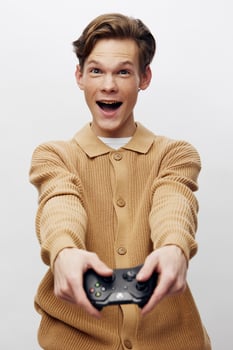 Happy Young Gamer Enjoying Console Gaming in the Comfort of Home photo
