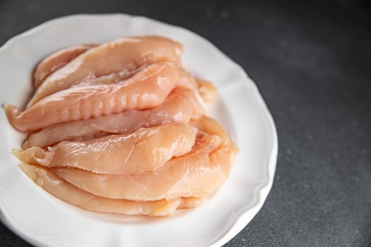 raw chicken meat aiguillettes fresh cooking meal food snack on the table copy space food background rustic top view photo