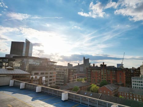 High Angle View of Greater Manchester City Centre Buildings During Beautiful Sunny day over England UK. May 5th, 2024 photo