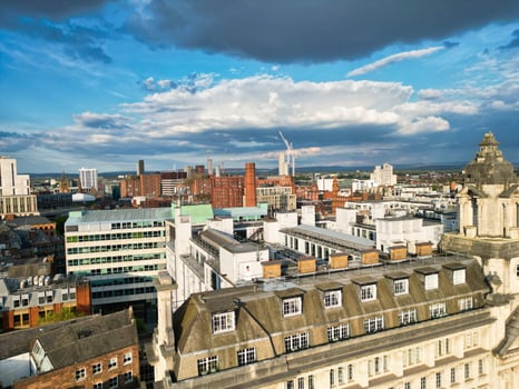 High Angle View of Greater Manchester City Centre Buildings During Beautiful Sunny day over England UK. May 5th, 2024 photo