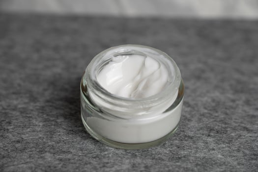 Skincare jar with cosmetic anti aging cream . photo