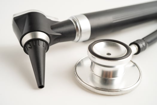 Otoscope for audiologist or ENT doctor use otoscope checking ear and treate hearing loss problem. photo