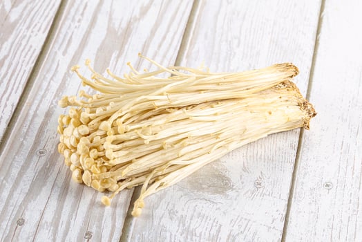 Tasty raw enoki mushroom heap photo