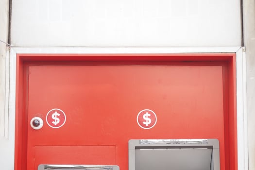CCTV security camera operating on atm booth photo