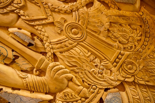Wood carving in Thailand craftsman. photo