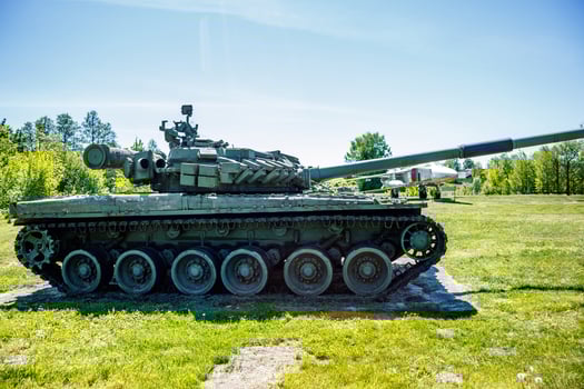 tank t80, armored vehicles with dynamic protection unit on street in green khaki color photo