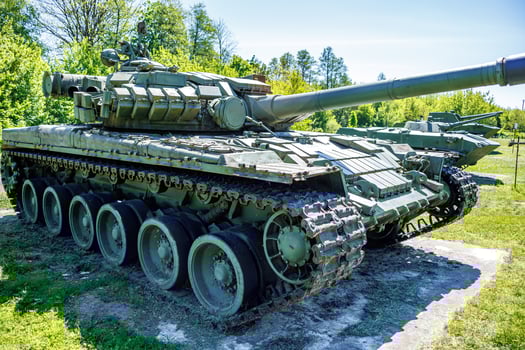 tank t80, armored vehicles with dynamic protection unit on street in green khaki color photo
