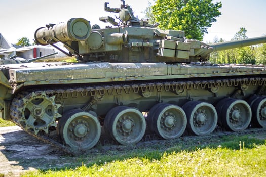 tank t80, armored vehicles with dynamic protection unit on street in green khaki color photo
