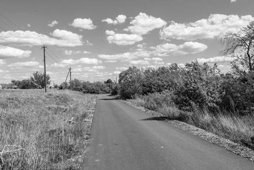 Beautiful empty asphalt road in countryside on light background photo
