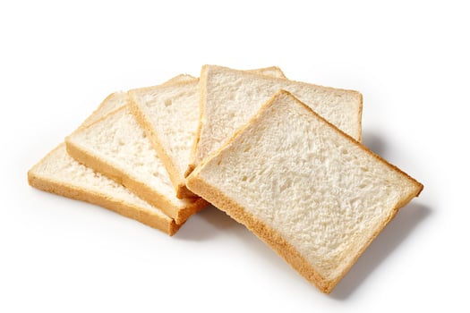 Stack of fresh white bread slices for toasts or sandwiches photo