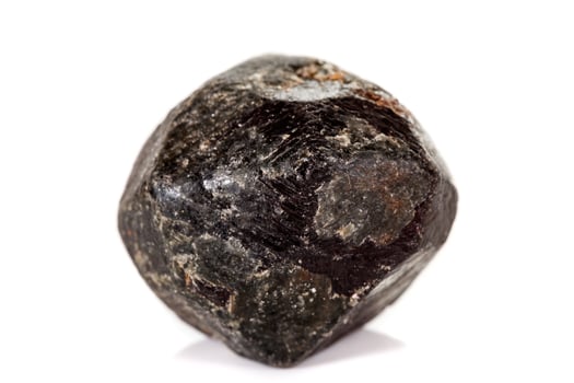 macro mineral stone Garnet, on a white background photo