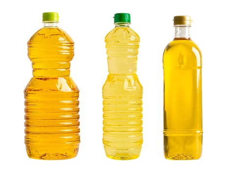 Vegetable oil with olive oil in different bottle for cooking isolated on white background with clipping path. photo