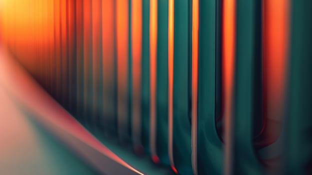 A closeup of a radiator with its curved fins and painted surface giving off heat to warm a room photo
