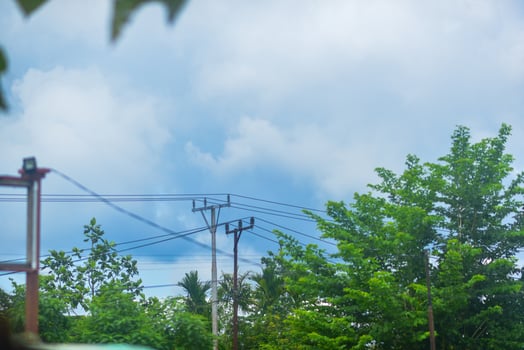 a red and white kite flying in the sky photo
